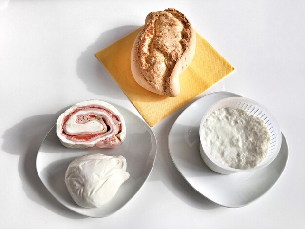 High angle view of sicilian food on white background