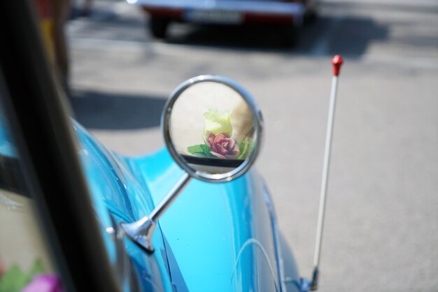 High angle view of side-view mirror on street