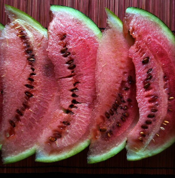 High angle view of sliced watermelons on table