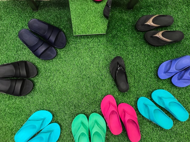 Photo high angle view of slippers on grass