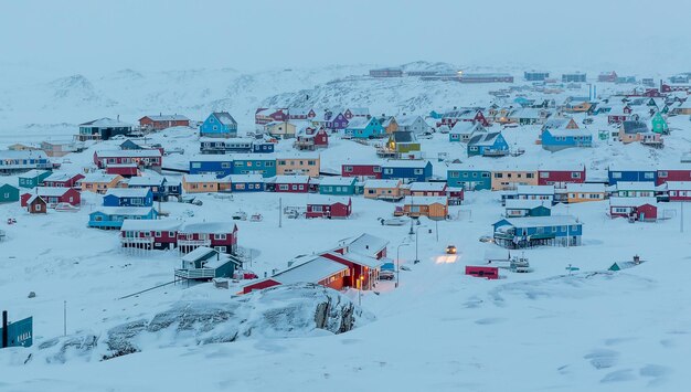 High angle view of snow covered land against sky