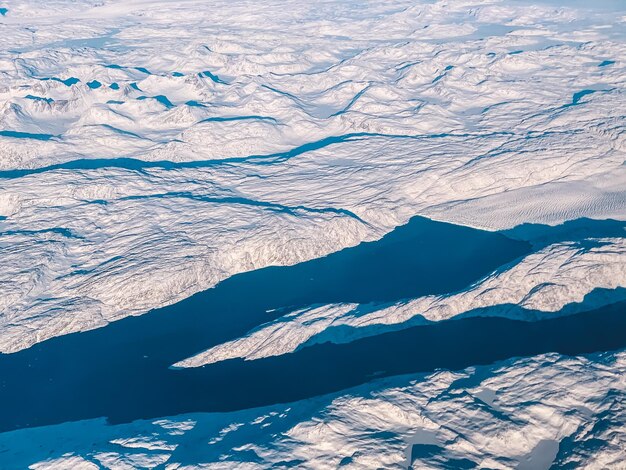 Photo high angle view of snowcapped mountains