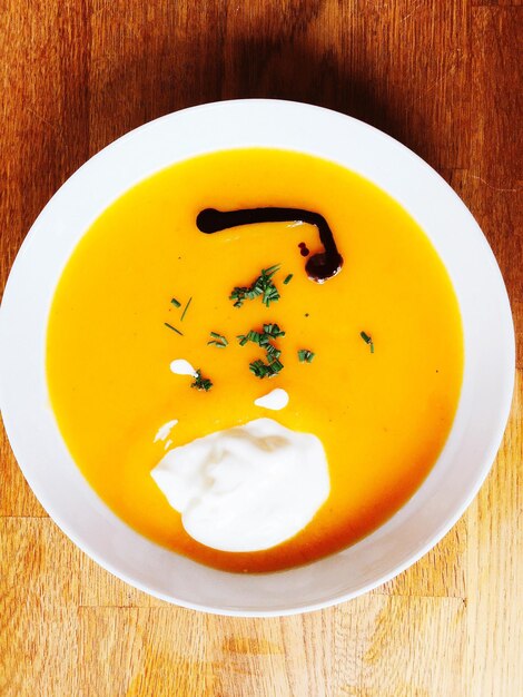 High angle view of soup in plate on table