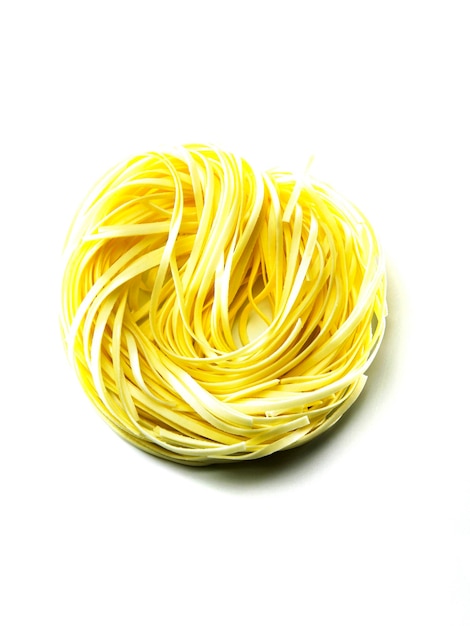 Photo high angle view of spaghetti over white background