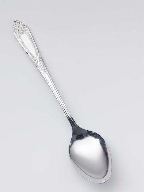 Photo high angle view of spoon on white background