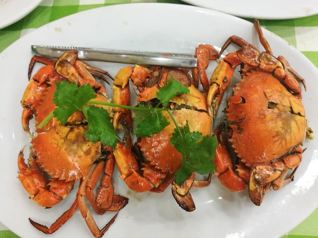 High angle view of steamed crabs served in plate