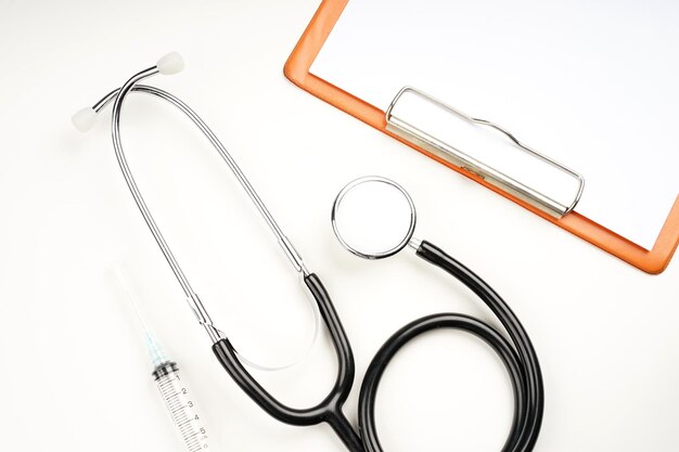 high angle view of stethoscope against white background