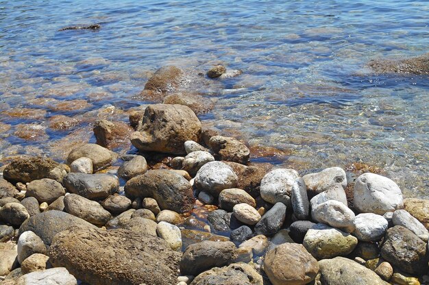 High angle view of stones on beach