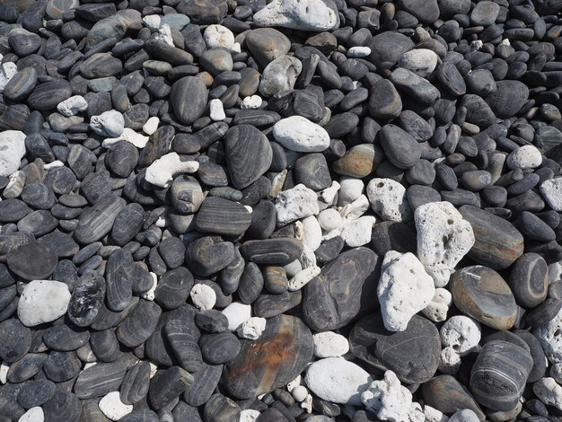 High angle view of stones on pebbles