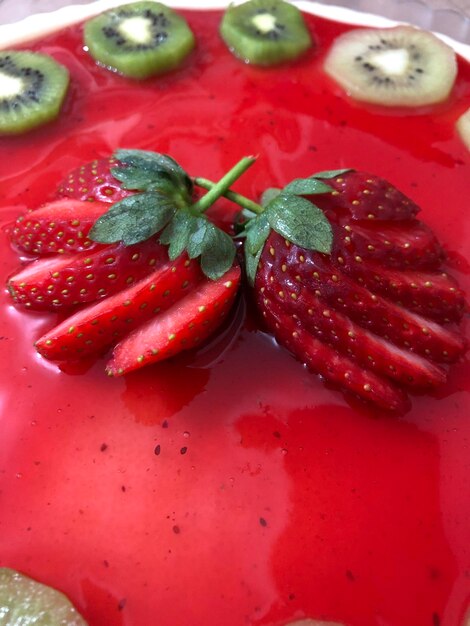 High angle view of strawberries in plate on table