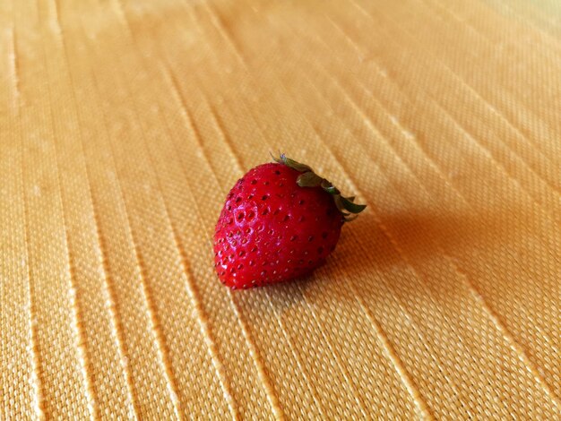 High angle view of strawberries on table