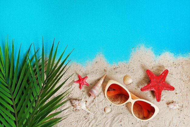 High angle view of sunglasses on beach