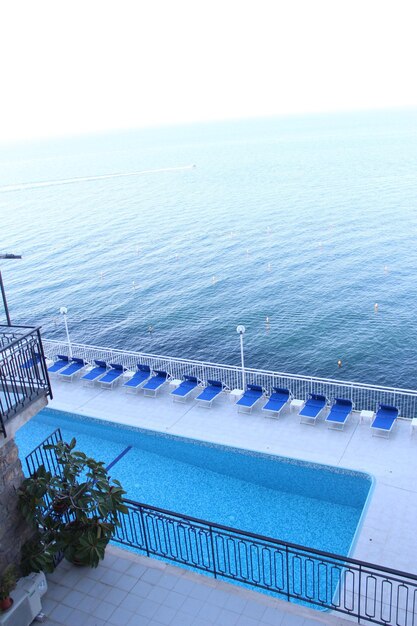 High angle view of swimming pool against sea