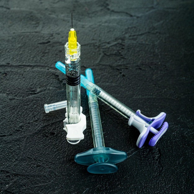 High angle view of syringe on floor