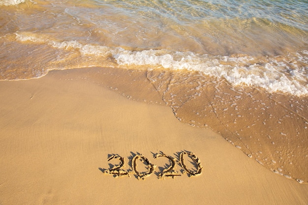 Photo high angle view of text on beach