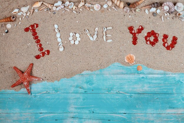 Photo high angle view of text on beach