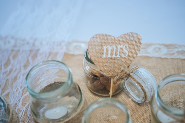 High angle view of text on glass jar on table