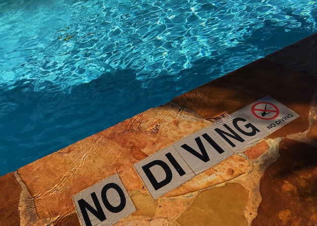 High angle view of text on poolside