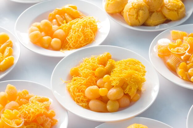 High angle view of thai dessert in white plate on table