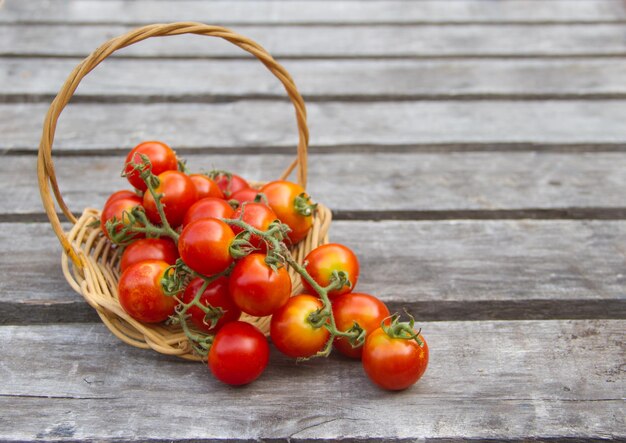 High angle view of tomatoes in basket on table