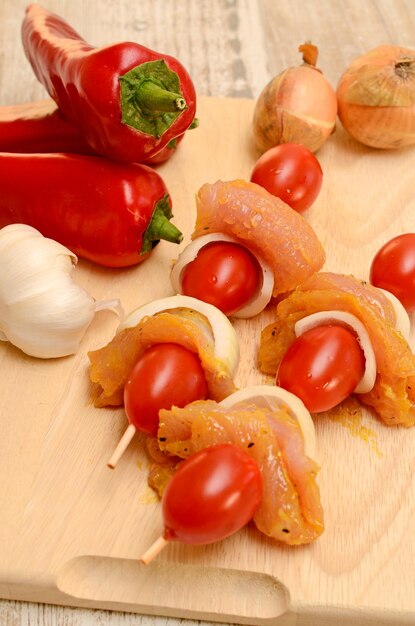 High angle view of tomatoes on cutting board