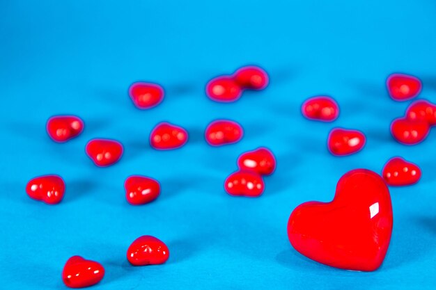 High angle view of tomatoes on table against blue background