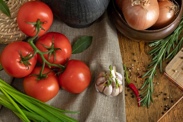 high angle view of tomatoes and vegetables on table