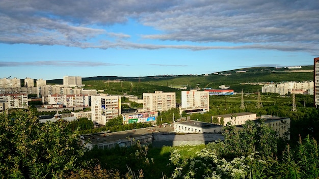 High angle view of town against cloudy sky