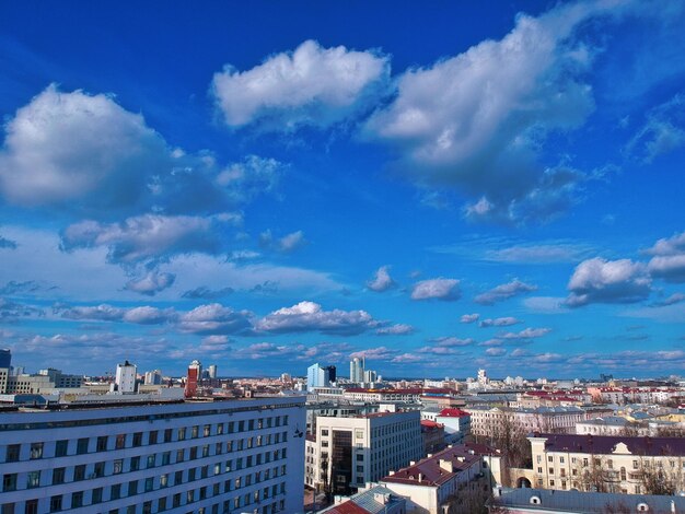 High angle view of townscape against blue sky