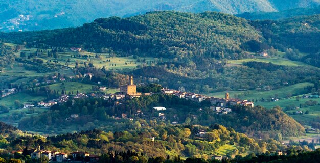 High angle view of townscape by mountain