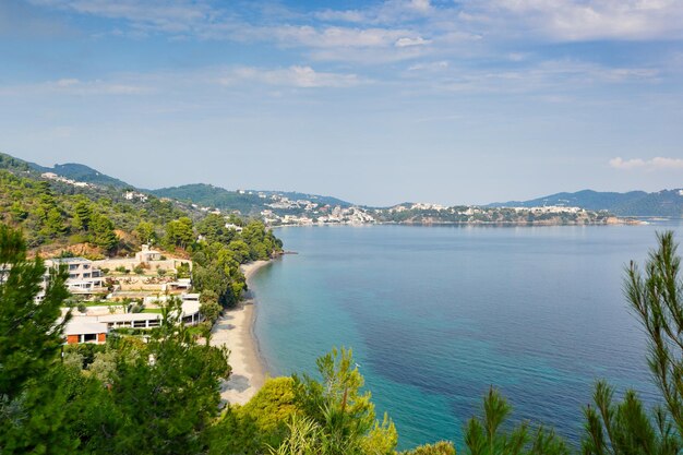 High angle view of townscape by sea against sky