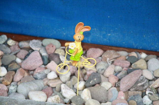 High angle view of toy on stones at home