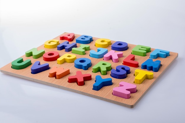 High angle view of toys on table against white background