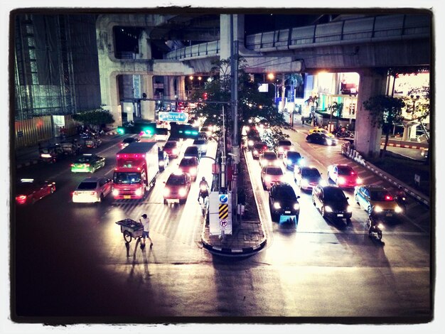 High angle view of traffic on city street at night