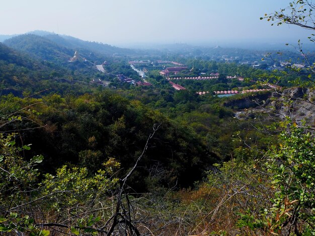 High angle view of trees and buildings against sky