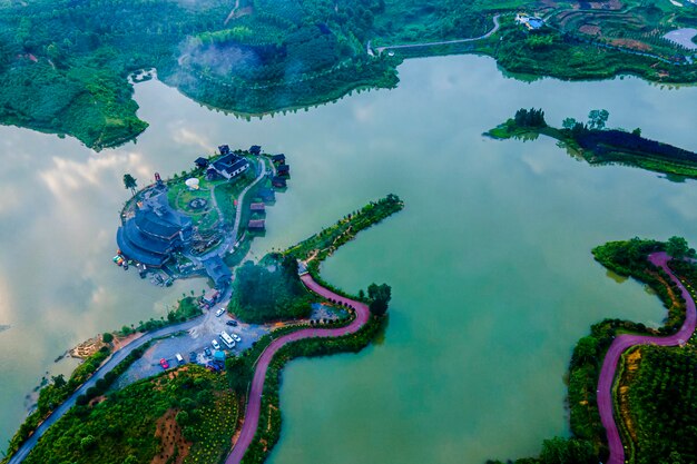 High angle view of trees by lake against sky