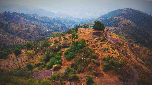 High angle view of trees and mountains against sky