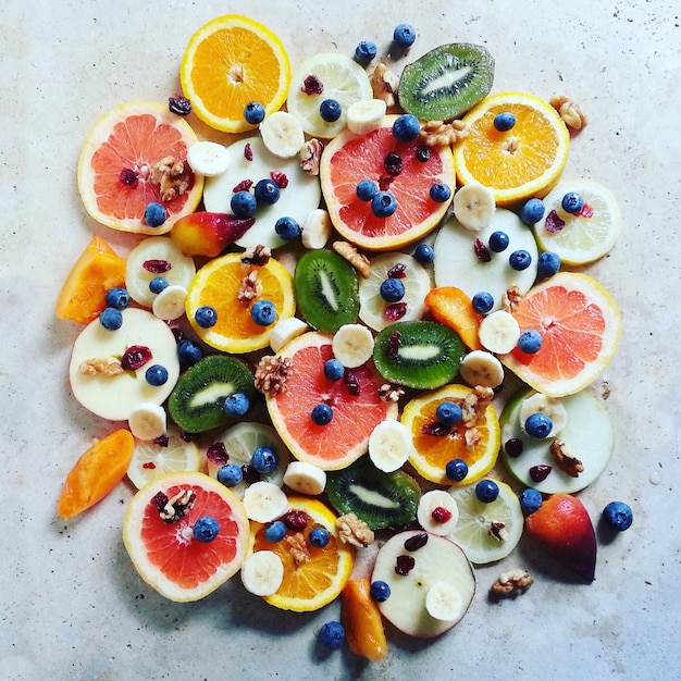 Photo high angle view of various fruits on table