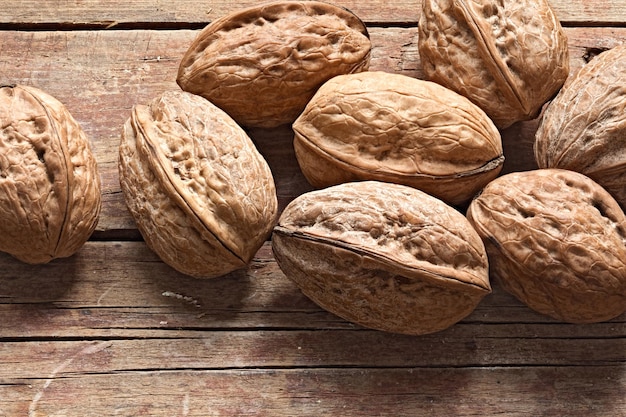 High angle view of walnuts on wooden table
