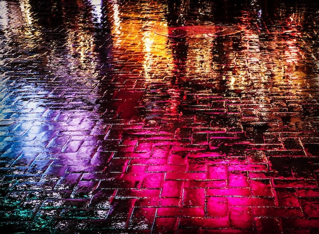 Photo high angle view of wet road at night