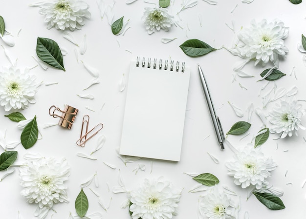 High angle view of white and paper on table