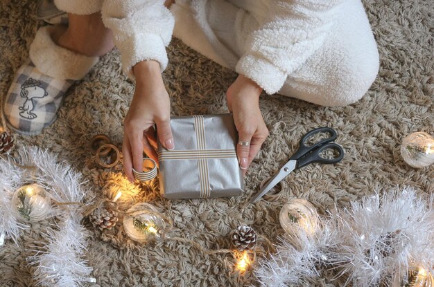 Photo high angle view of woman holding christmas decoration