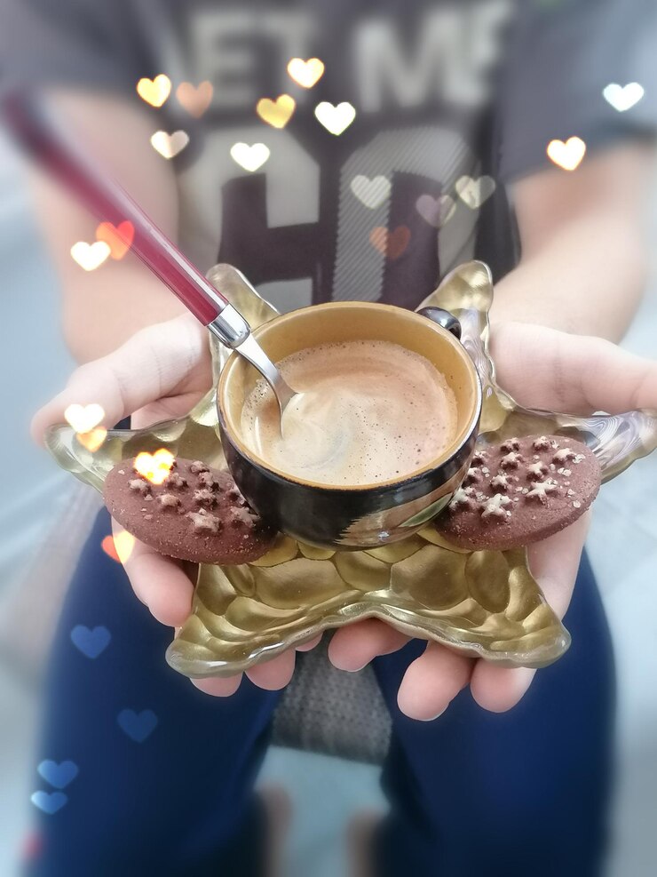 Photo high angle view of woman holding coffee cup