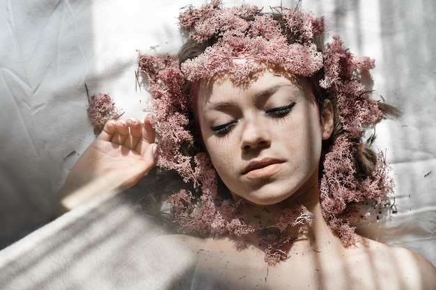 high angle view of woman lying on bed