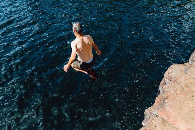 High angle view of woman standing in water