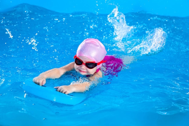 High angle view of woman swimming in pool