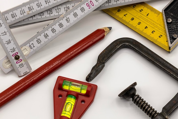 High angle view of work tools on white background