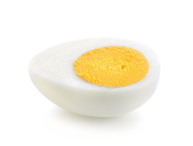 High angle view of yellow eggs against white background