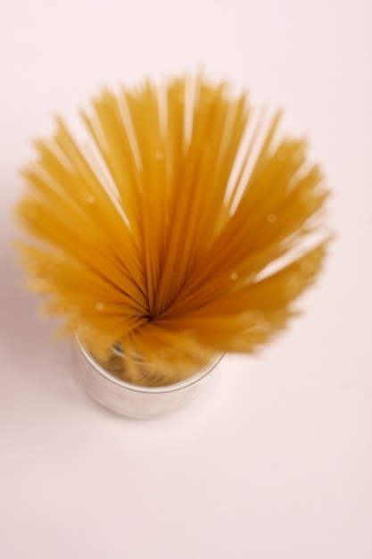 High angle view of yellow flower on table