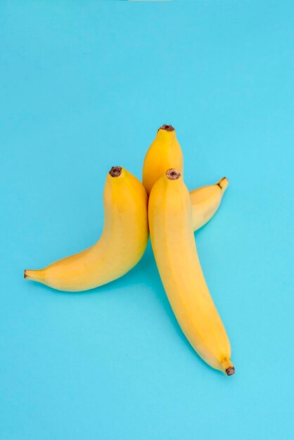 High angle view of yellow fruit on blue background